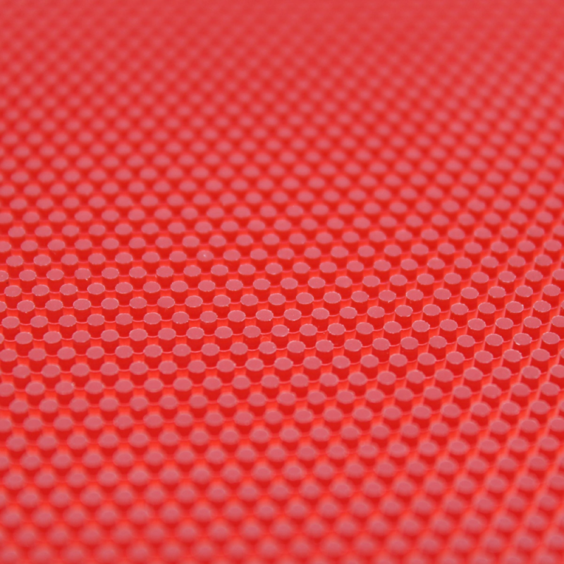 Sauer &amp; Tröger Schmerz hosszúszemcsés asztalitenisz-borítás piros gumilapjának szemcsés nézete